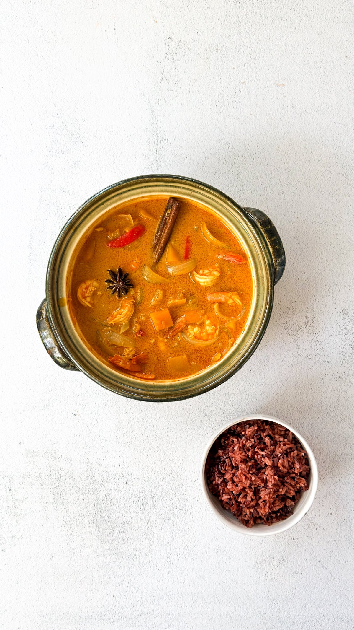 Thai coconut shrimp curry with butternut squash and bell pepper, flavored with cinnamon and star anise, made with Watcharee’s Thai Coconut Curry Sauce